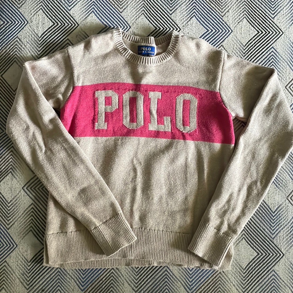 Beige Polo Ralph Lauren Sweater with “Polo” in red. Excellent condition.